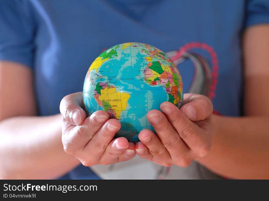 Earth globe in hand, Love the world