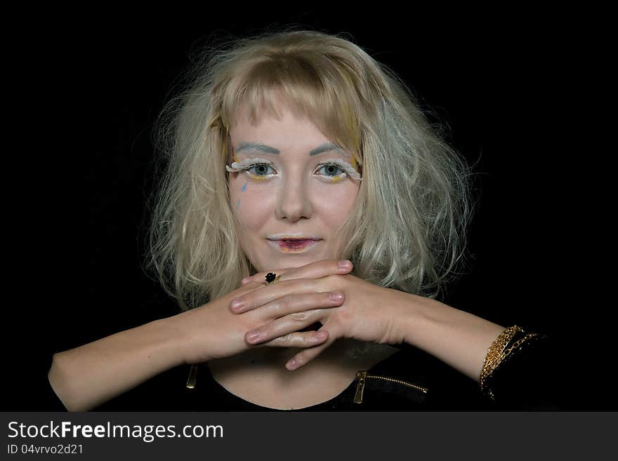 Girl with light hair in a make-up of an angel. Girl with light hair in a make-up of an angel