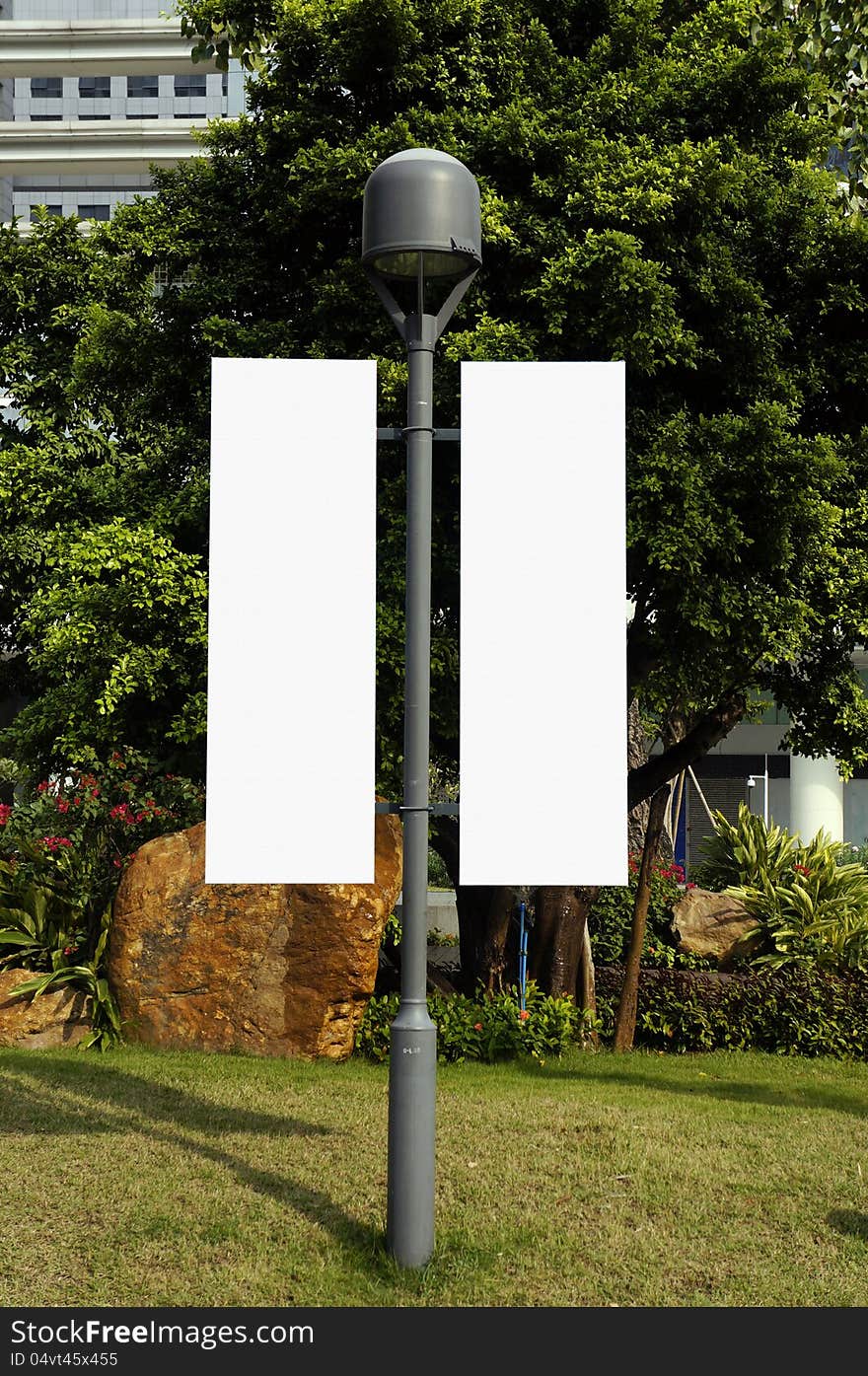 Blank Signpost On Lamppost