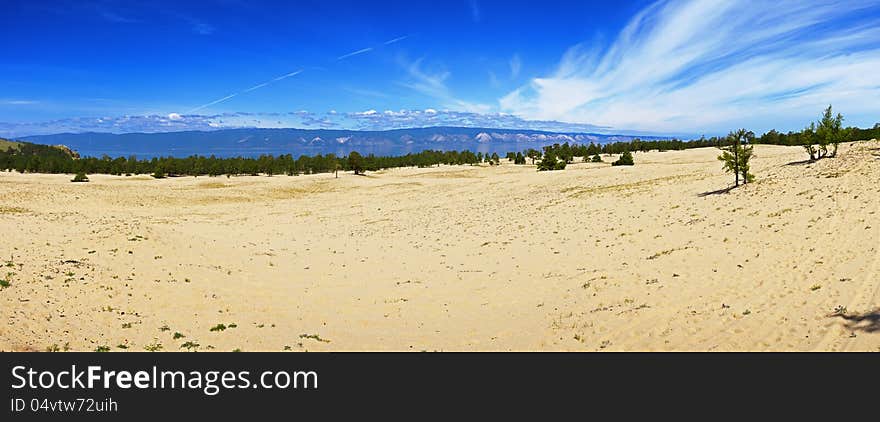 Panorama of the western coast of island Olkhon on lake Baikal about settlement Huzhir