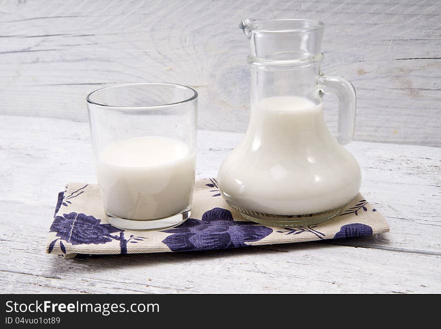 Jug And Glass With Milk And Sugars