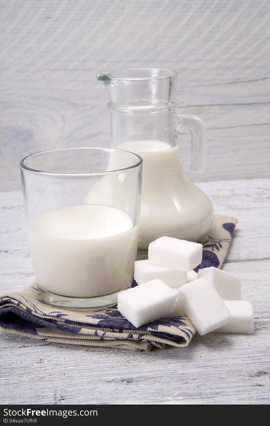 Jug And Glass With Milk And Sugars