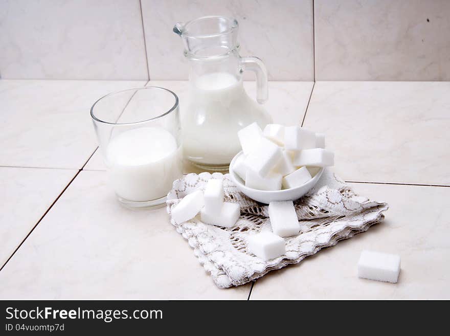 Jug And Glass With Milk And Sugars