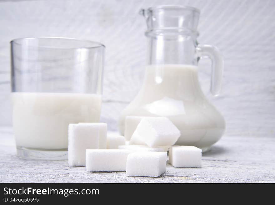 Jug And Glass With Milk And Sugars