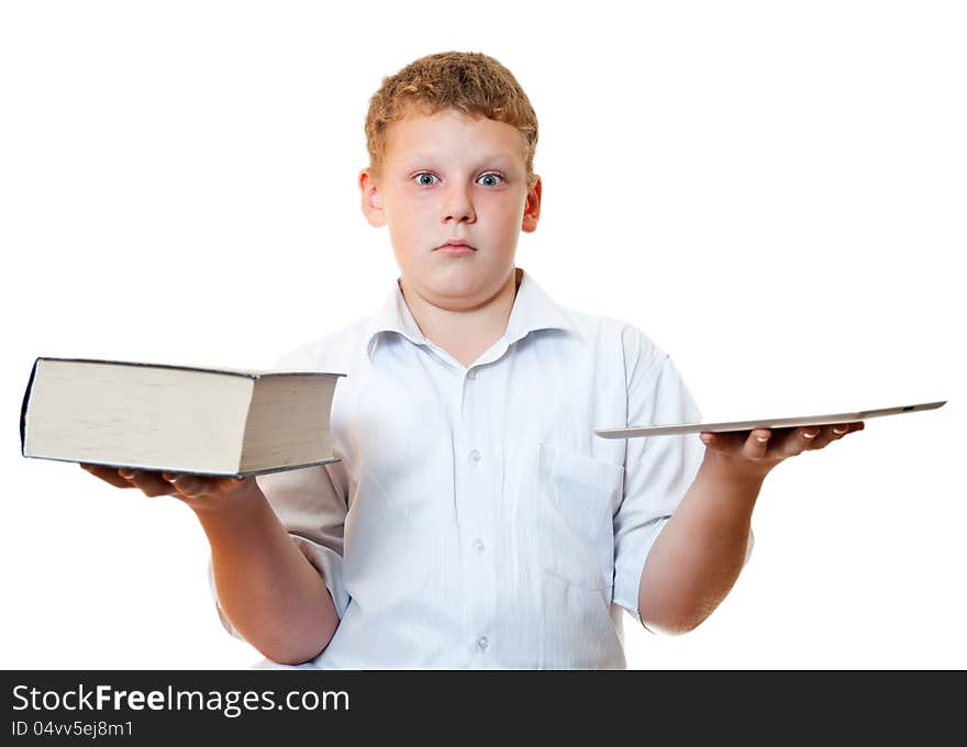 The boy with the book and tablet computer on a white background