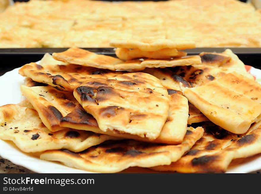 Grilled pieced of italian flatbread. Grilled pieced of italian flatbread