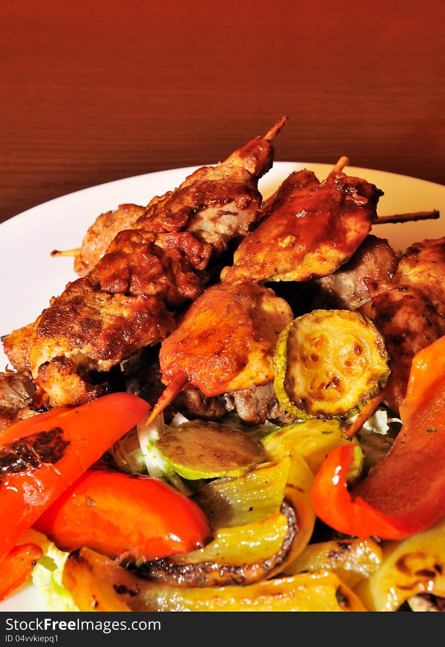 Appetizer meat kebab with vegetables