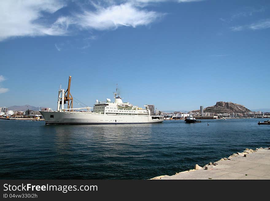 Merchant ship leaving the port of Alicante; Spain. Merchant ship leaving the port of Alicante; Spain.