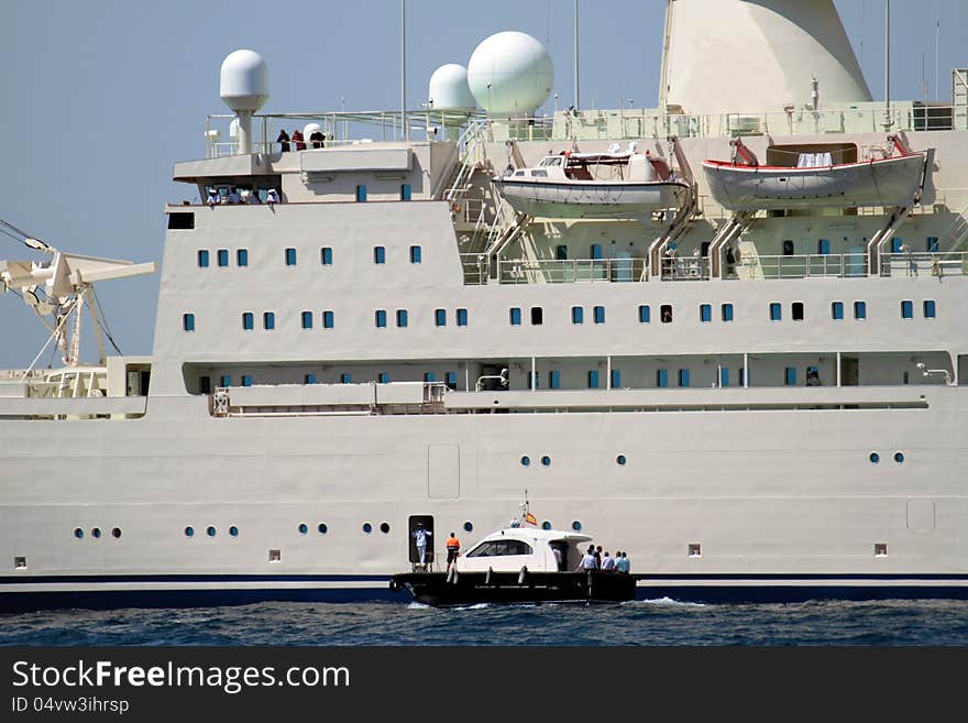 Merchant ship and pilot cutter