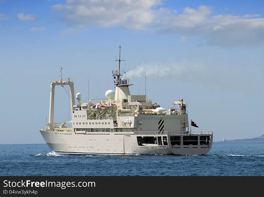 Merchant ship and tug