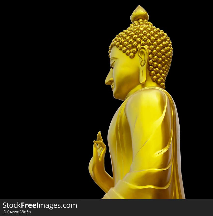 Isolate golden Buddha on the side of a black background. Isolate golden Buddha on the side of a black background.