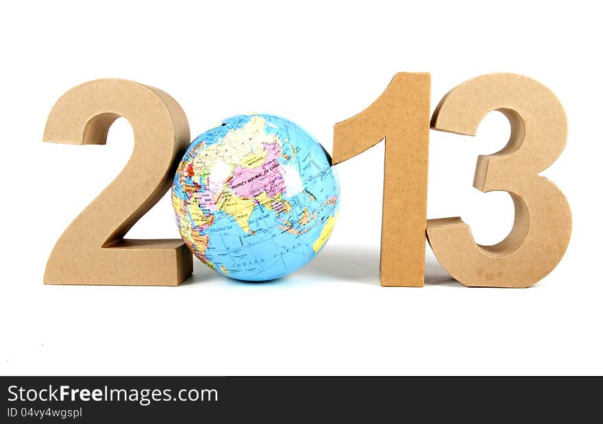 Paper numbers an a globe forming 2013 as for the new year. Paper numbers an a globe forming 2013 as for the new year