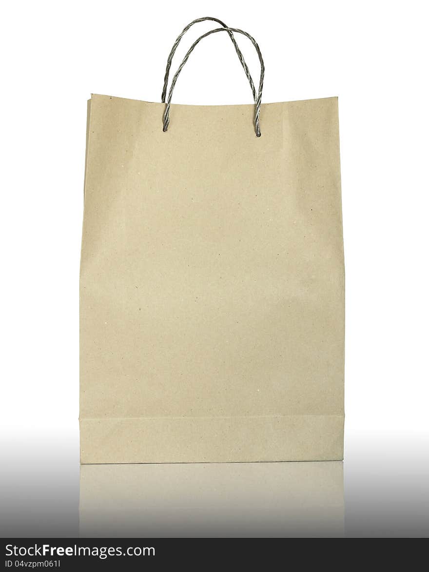 Brown paper bag on white background