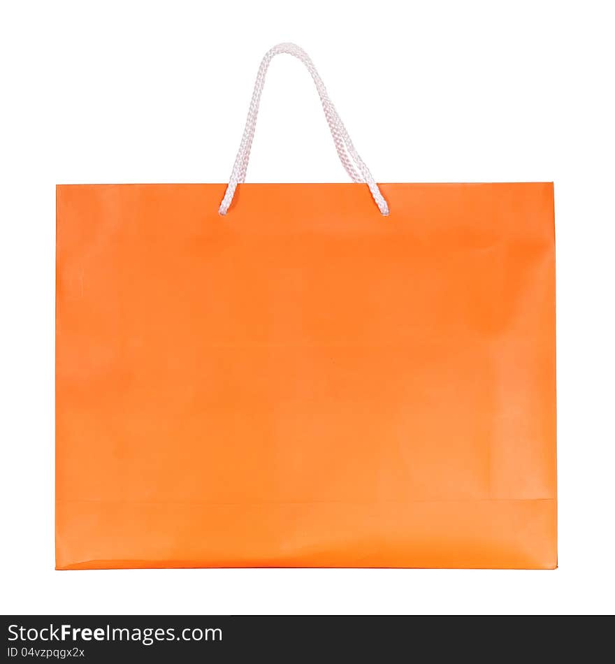 Orange shopping paper bag isolated on white with clipping path