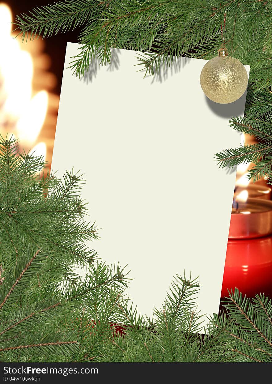 Christmas decoration. Blank paper for text between fir twigs on background with candles. Christmas decoration. Blank paper for text between fir twigs on background with candles