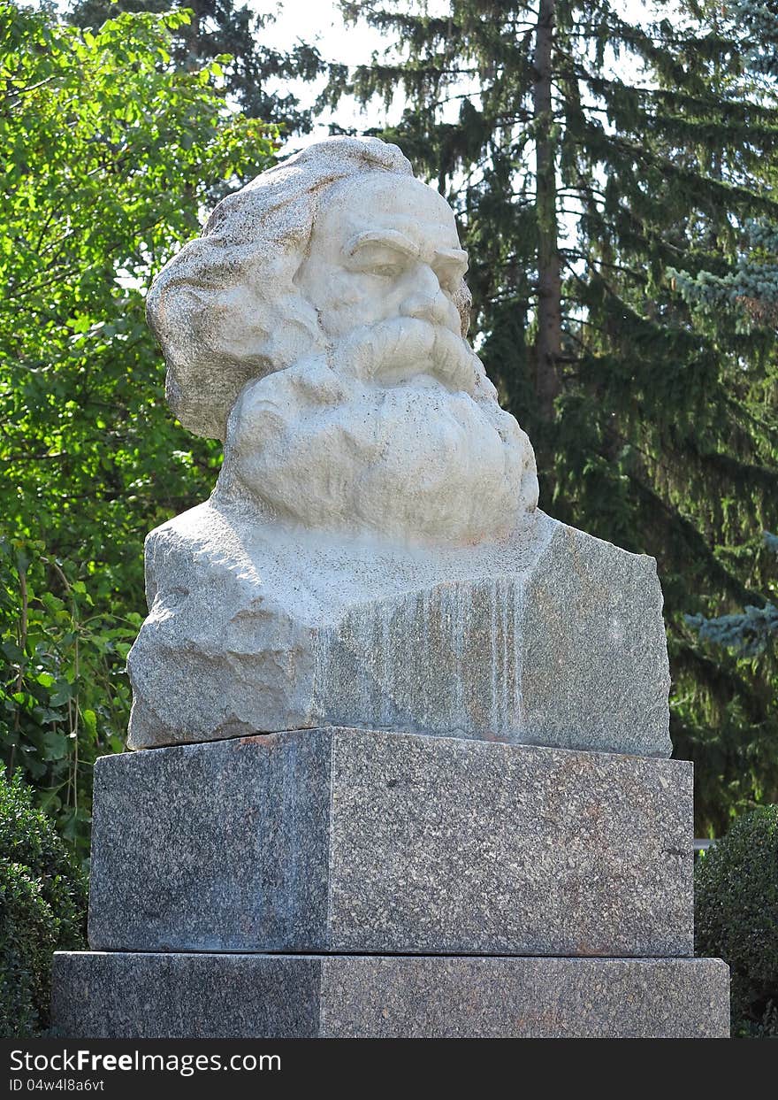 Karl Marx bust stone statue in East Europe