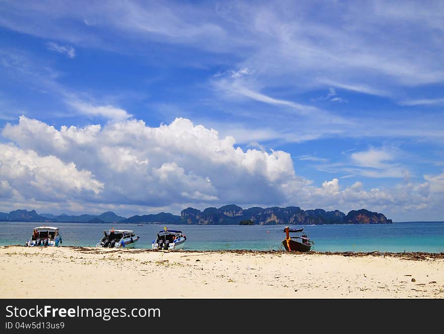 Long tail boat on the beach.