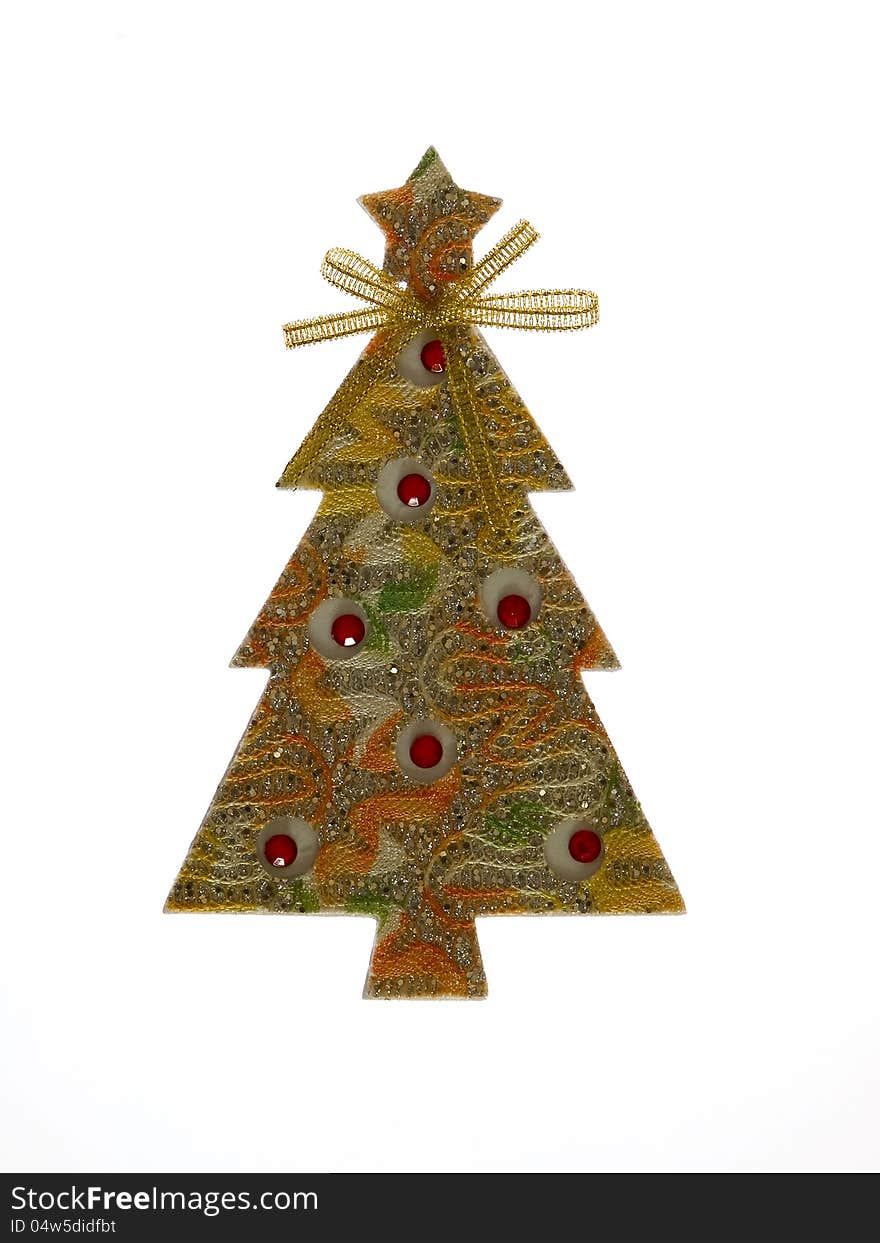 Christmas tree decoration with silver, gold, green and yellow pattern. At the top of the tree pentagonal star.