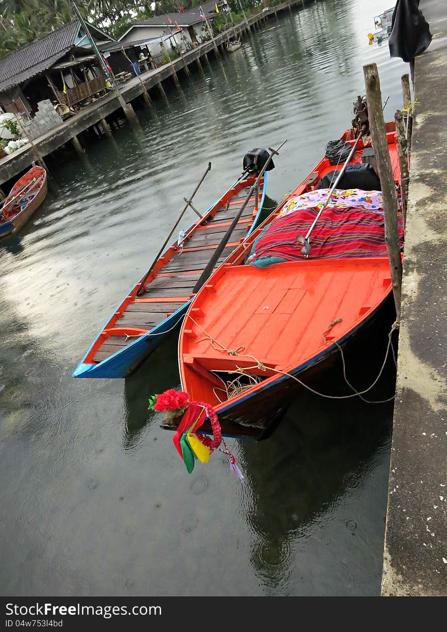 Boat berth fishing village on a cloudy day