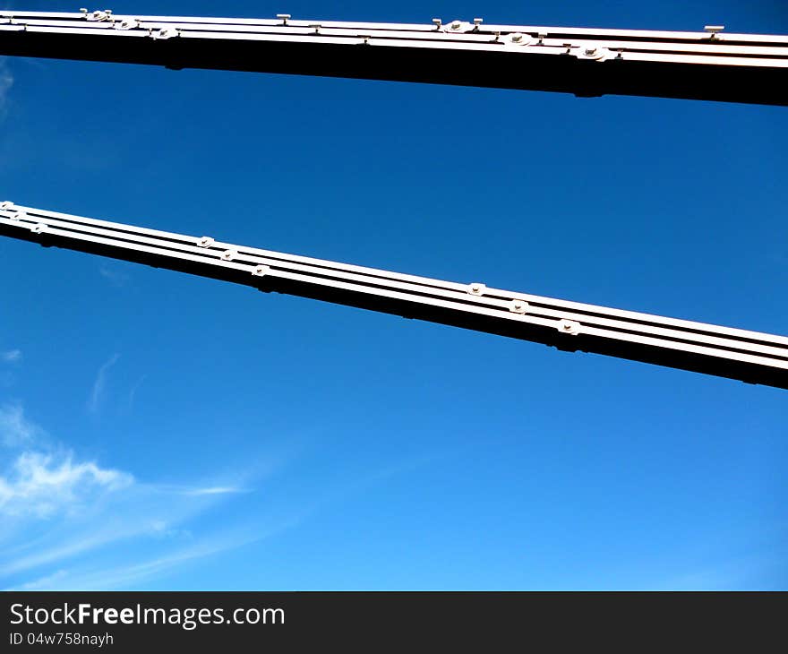 A view looking up at the Clifton Suspension Bridge, Bristol, UK.