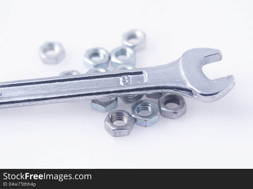 Silver wrench,  on white background