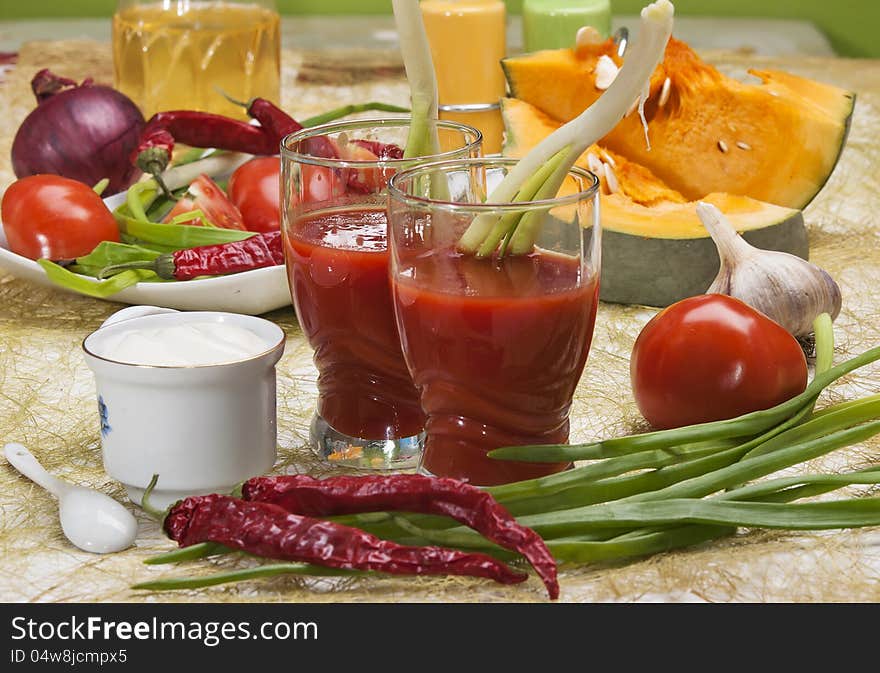 Tomato Juice and group of different vegetables