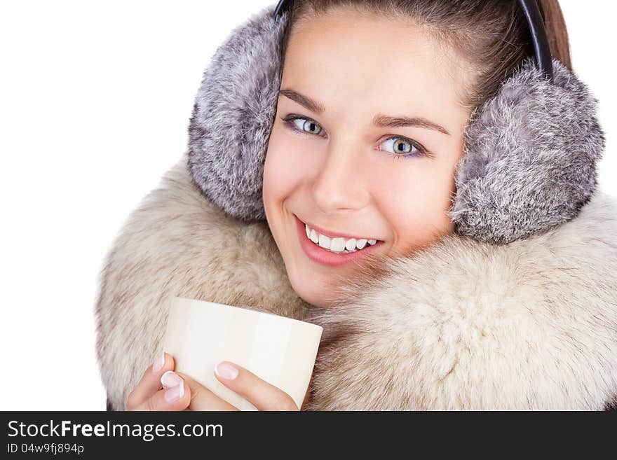 Beautiful young girl drinking coffee or tea. Beautiful young girl drinking coffee or tea