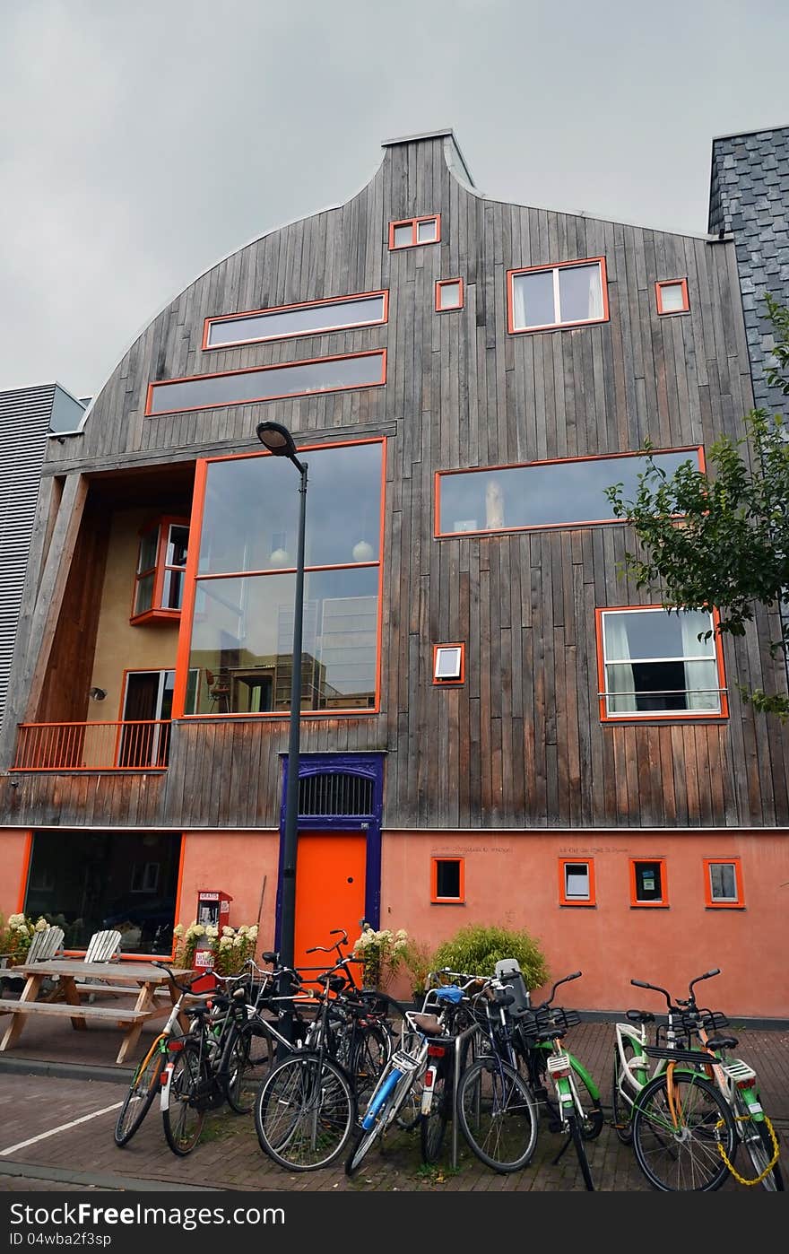 This image presents a modern, yet strange facade of a building from Amsterdam. This image presents a modern, yet strange facade of a building from Amsterdam