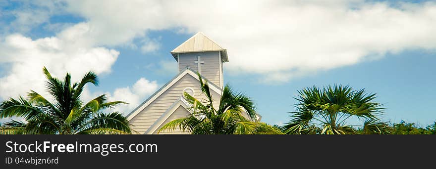 Wooden white church and palm trees, Bahamas. Wooden white church and palm trees, Bahamas