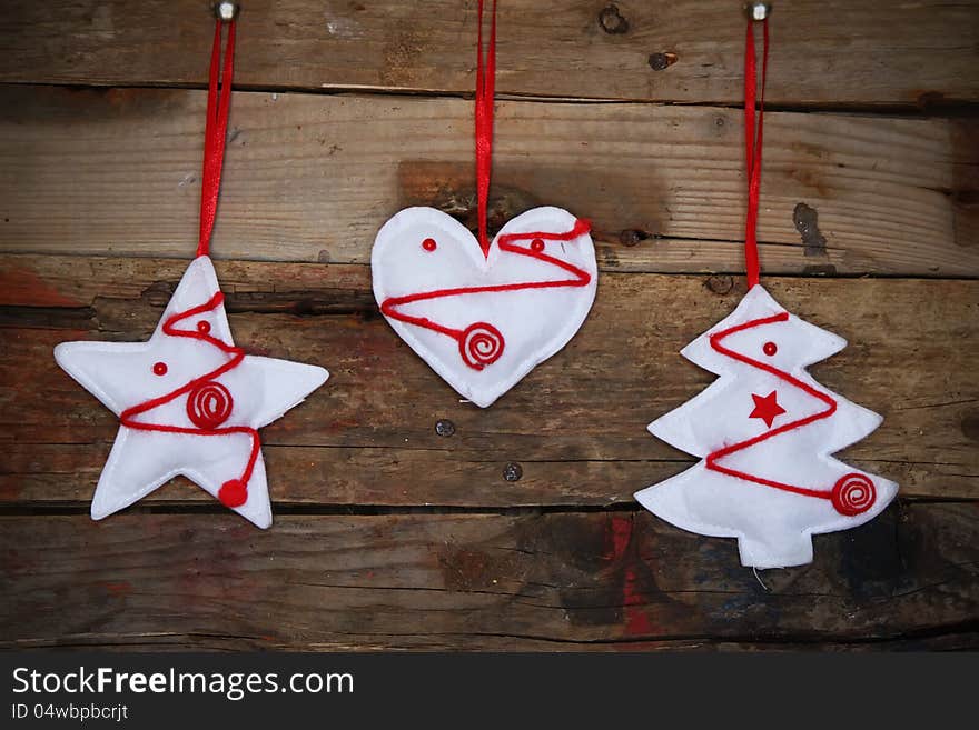 Photo of christmas decorations on wooden background. Photo of christmas decorations on wooden background