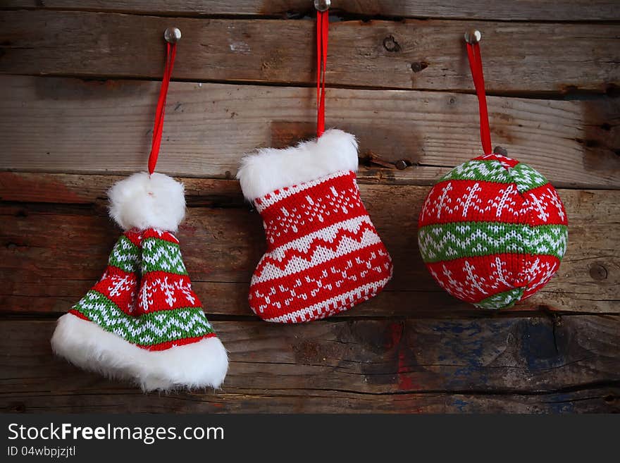 Photo of christmas decorations on wooden background. Photo of christmas decorations on wooden background