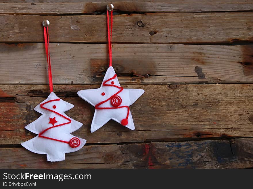 Photo of christmas decorations on wooden background. Photo of christmas decorations on wooden background