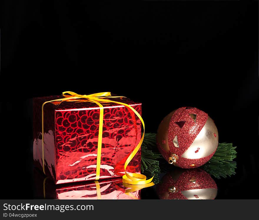 Gift,Christmas Ball On The Branch Of A Tree