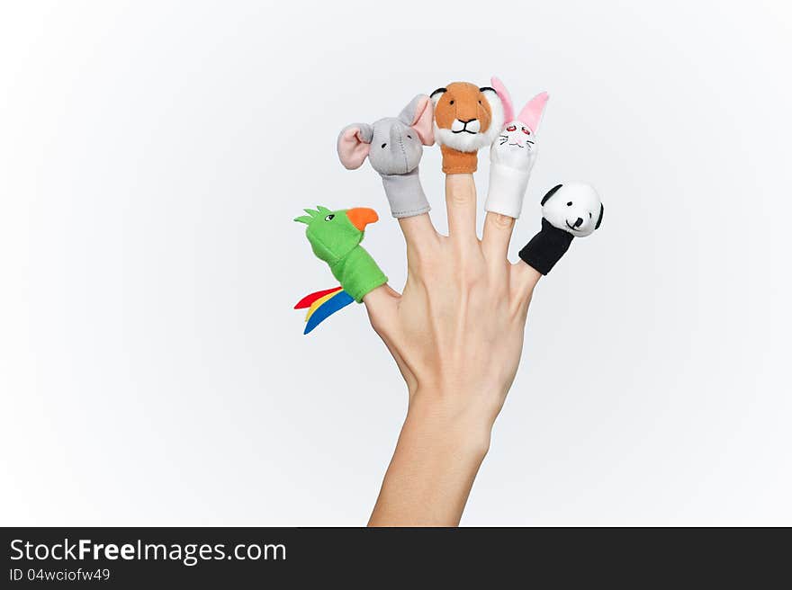 Female hand with animal finger puppets. Female hand with animal finger puppets