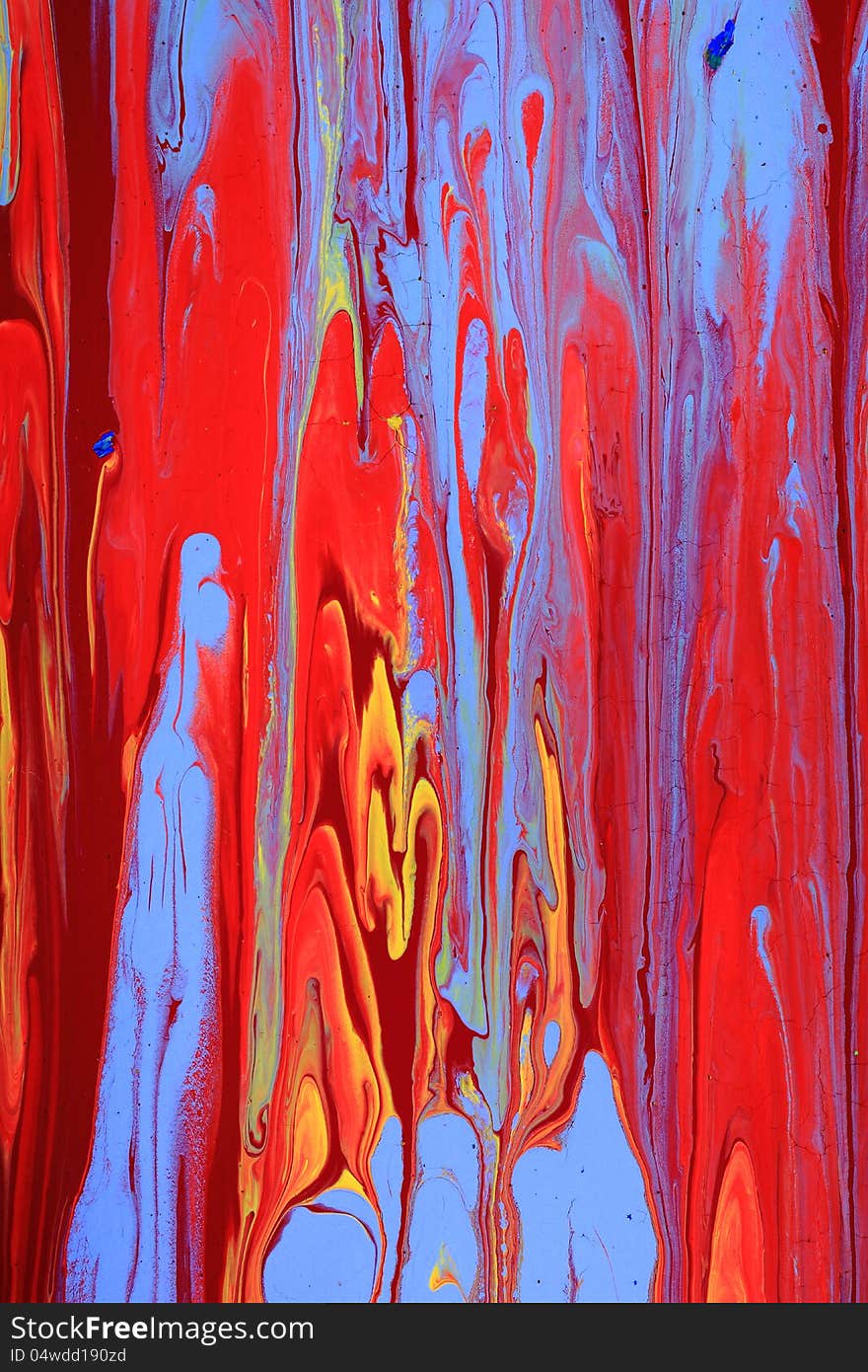 A background created by several paints mixing while being wet to an abstract painting. A background created by several paints mixing while being wet to an abstract painting