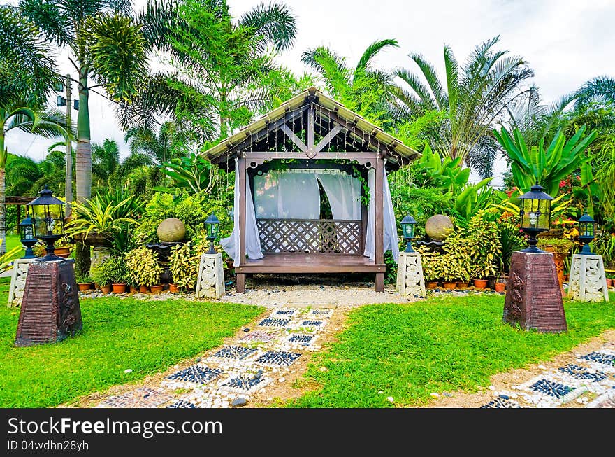 Classic cottage-style village at Agriculture Garden with nice tree