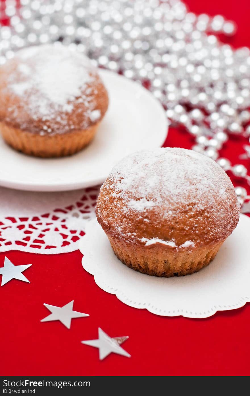 Christmas muffins on red background. Christmas muffins on red background