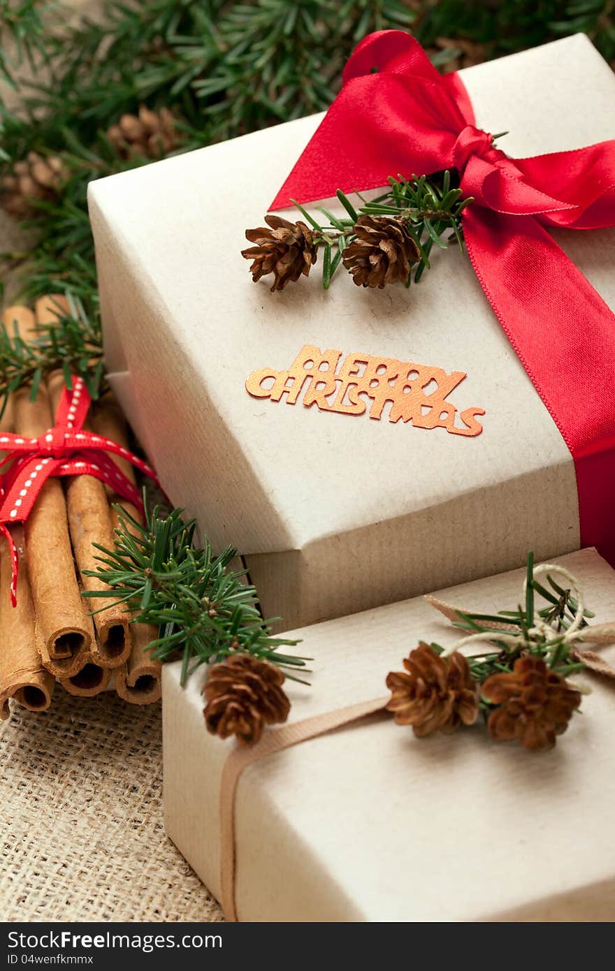 Christmas gift boxes and decorations, rustic style, closeup shot