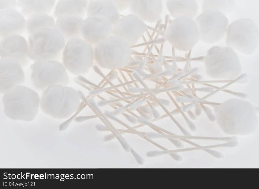 Bunch of q-tips in jar and table. Bunch of q-tips in jar and table