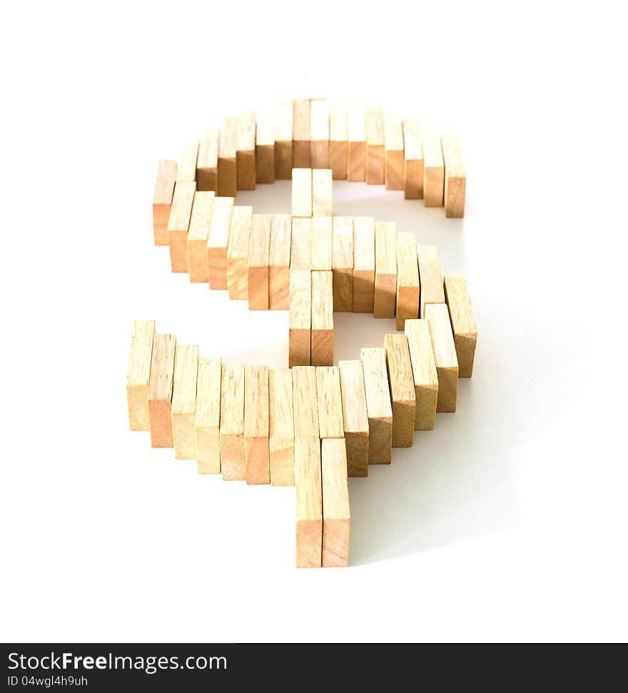 Symbol of dollar from wooden domino on white background. Symbol of dollar from wooden domino on white background