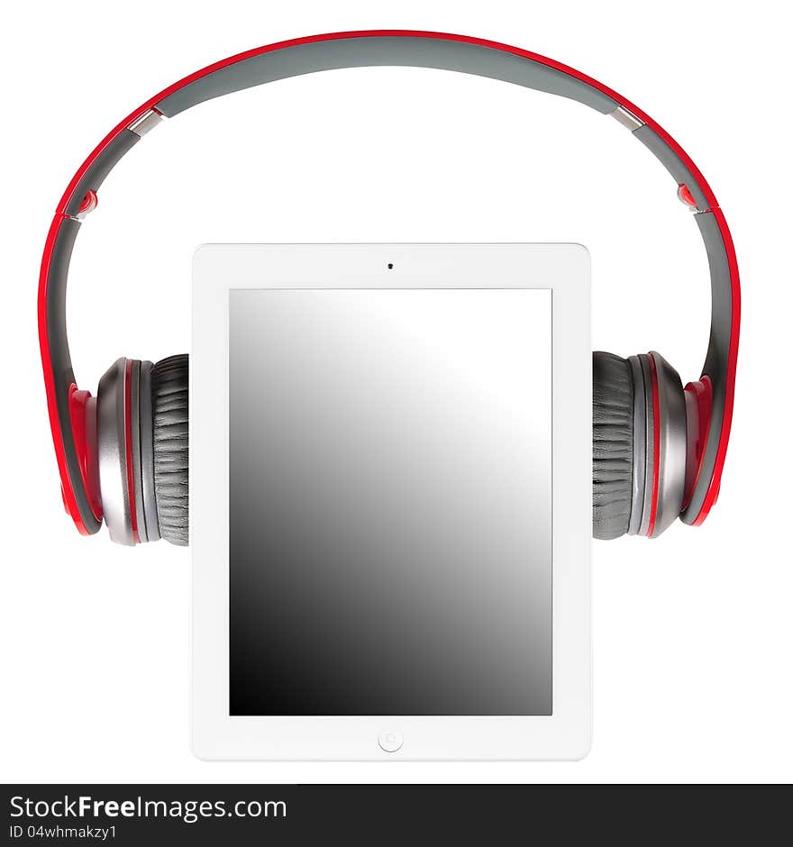 Head phones and tablet against white background. Head phones and tablet against white background.