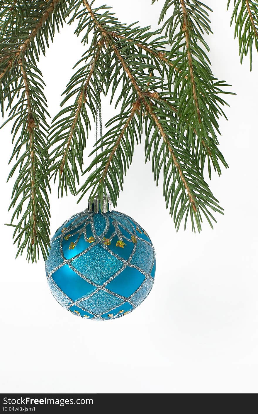 Christmas ball on a branch of Christmas tree