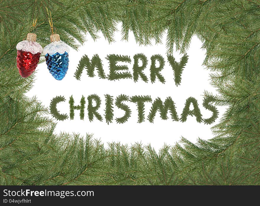 Merry Christmas inscription made from lot of spruce branches