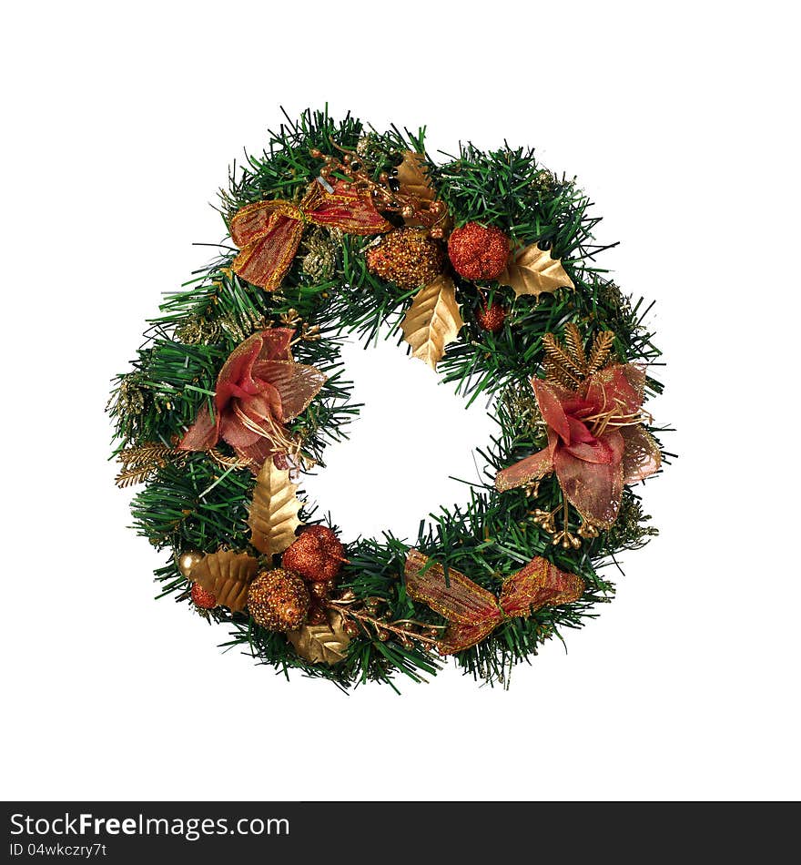 Christmas wreath with bows isolated on white background