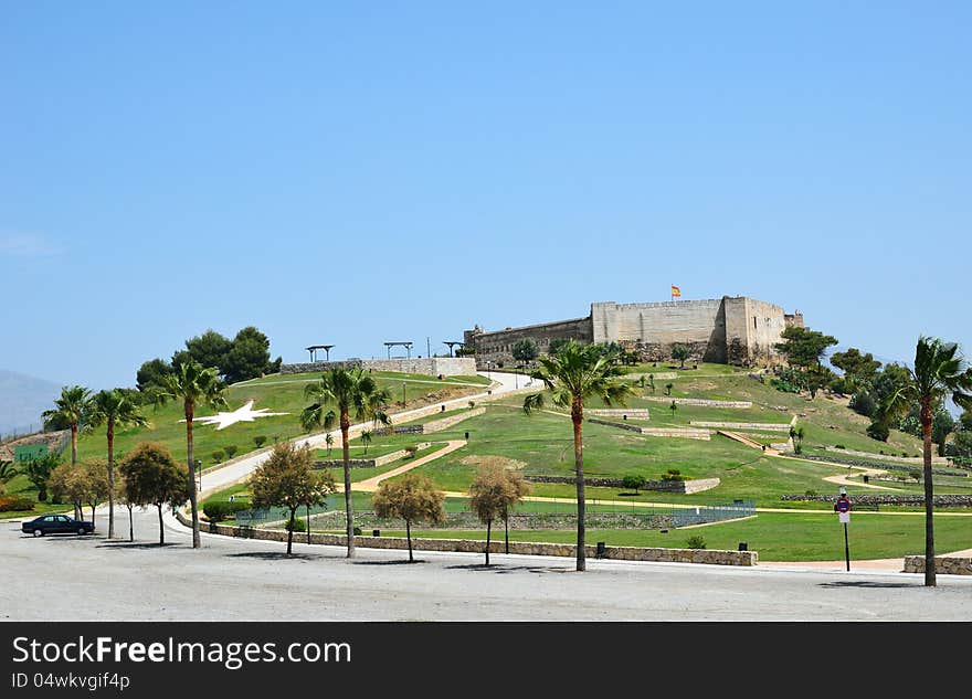 Ancient castle on the green hill of the Costa del Sol. Ancient castle on the green hill of the Costa del Sol