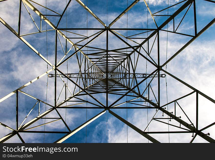 Power pole under cloudy sky