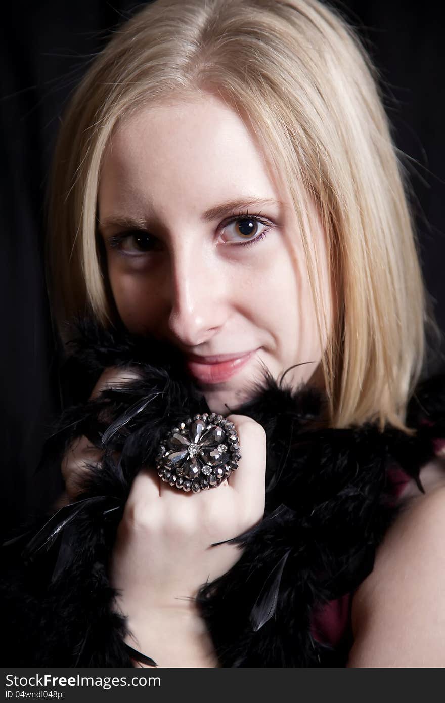 A beautiful woman against a black background