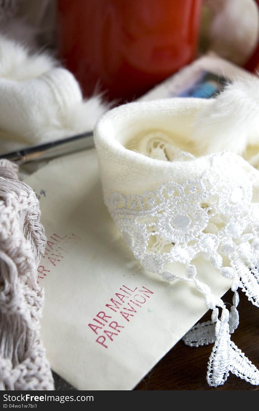 Close up air mail letter with scarf in winter