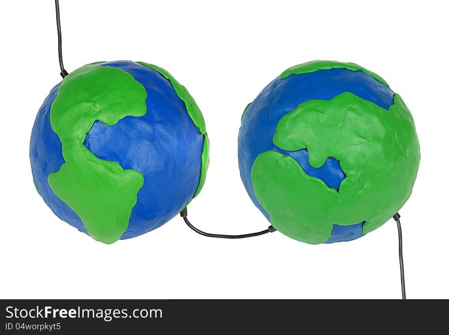 Two plasticine Hemisphere land with wires on a white background. Two plasticine Hemisphere land with wires on a white background