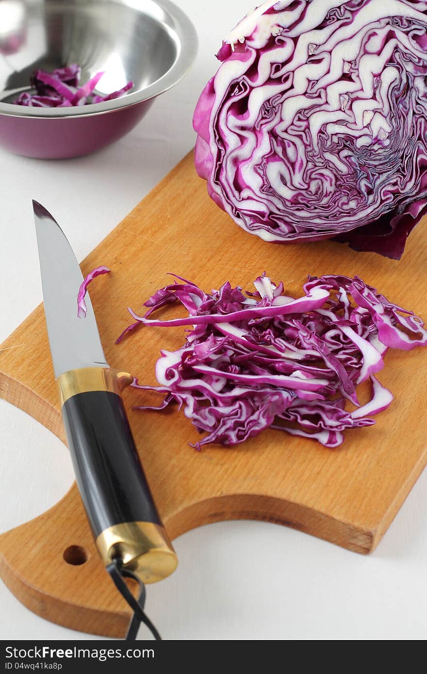 Red cabbage on the wood board